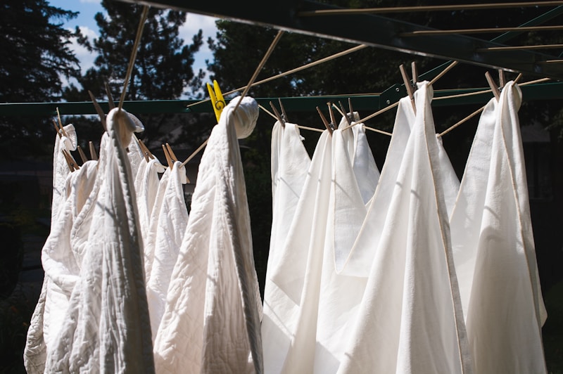 Fresh white laundry drying on a line