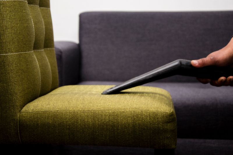 Professional upholstery cleaning on a sofa